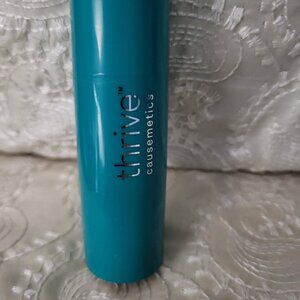 THRIVE CAUSEMETICS waterproof blush, highlighter, bronzer + contour stick.